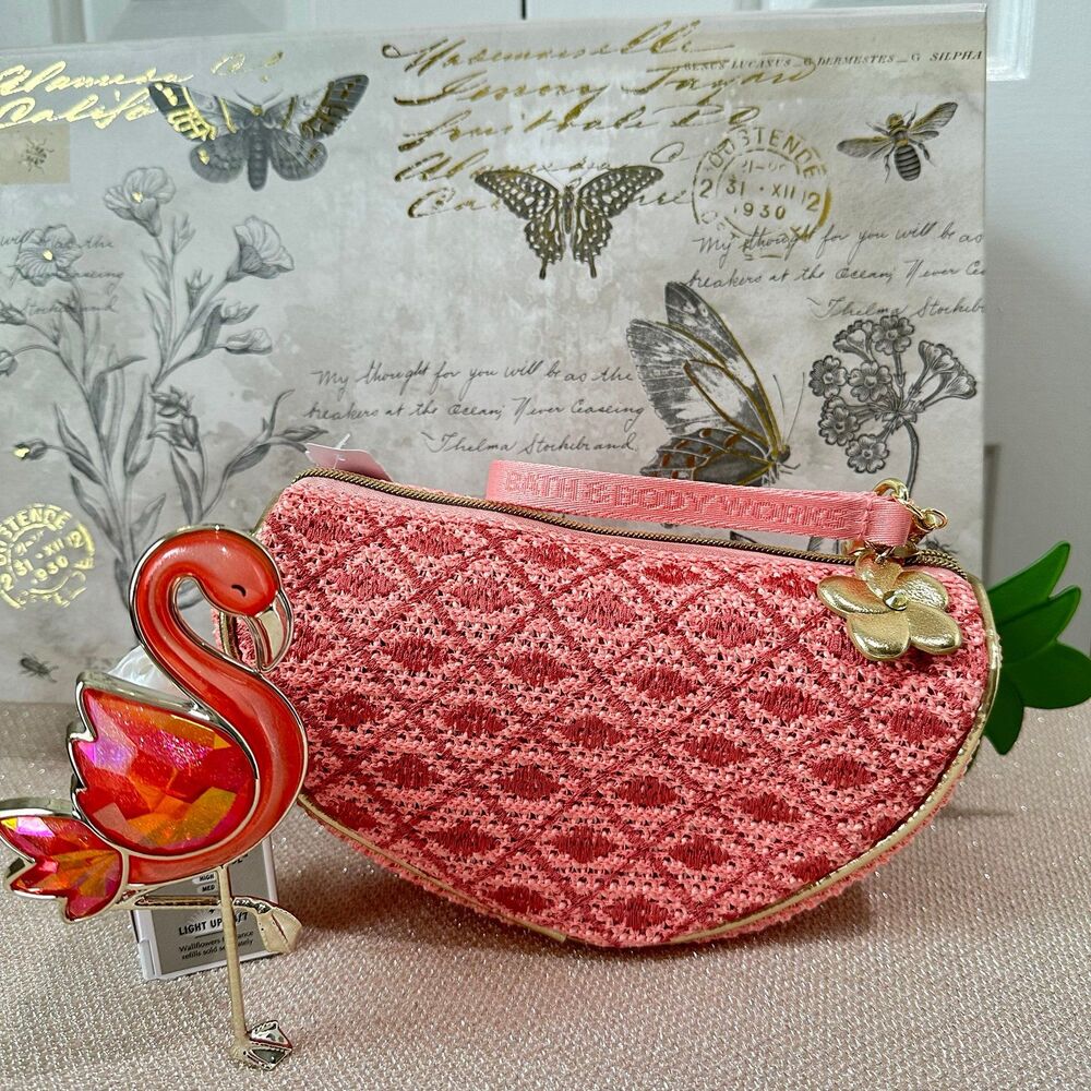 Bath & Body Works pink flamingo wall plug, and pink grapefruit cosmetic bag